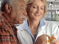 pharmacist talking to patient about prescription