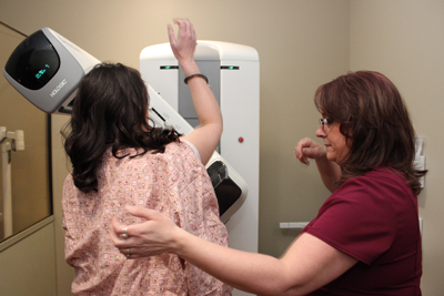 woman having mammogram