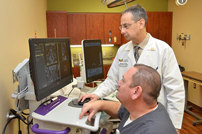 Michael Cher, M.D. with the UroNav Fusion Biopsy System