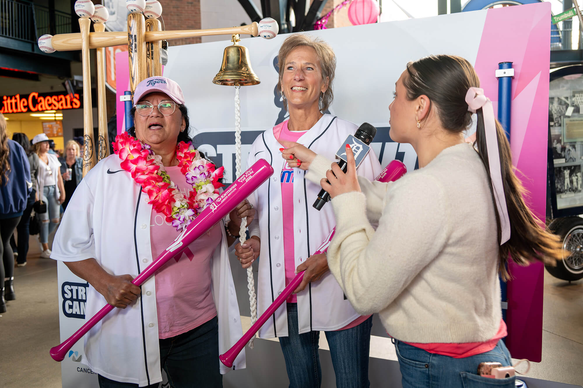Sofia Rogers, a five-month breast cancer survivor, and Karen Rettig, an eight-month cancer survivor