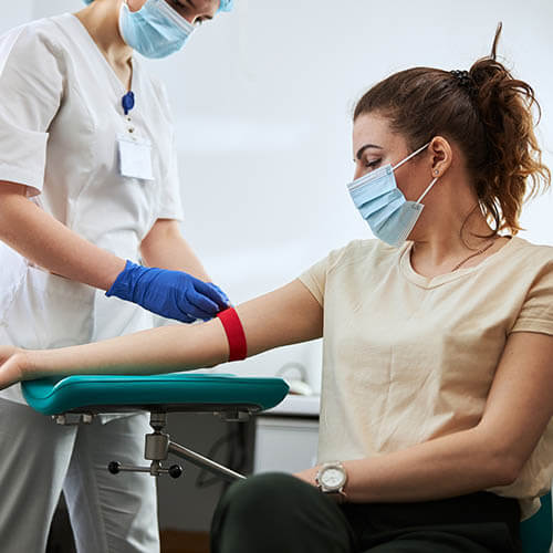 woman having blood drawn at a McLaren lab