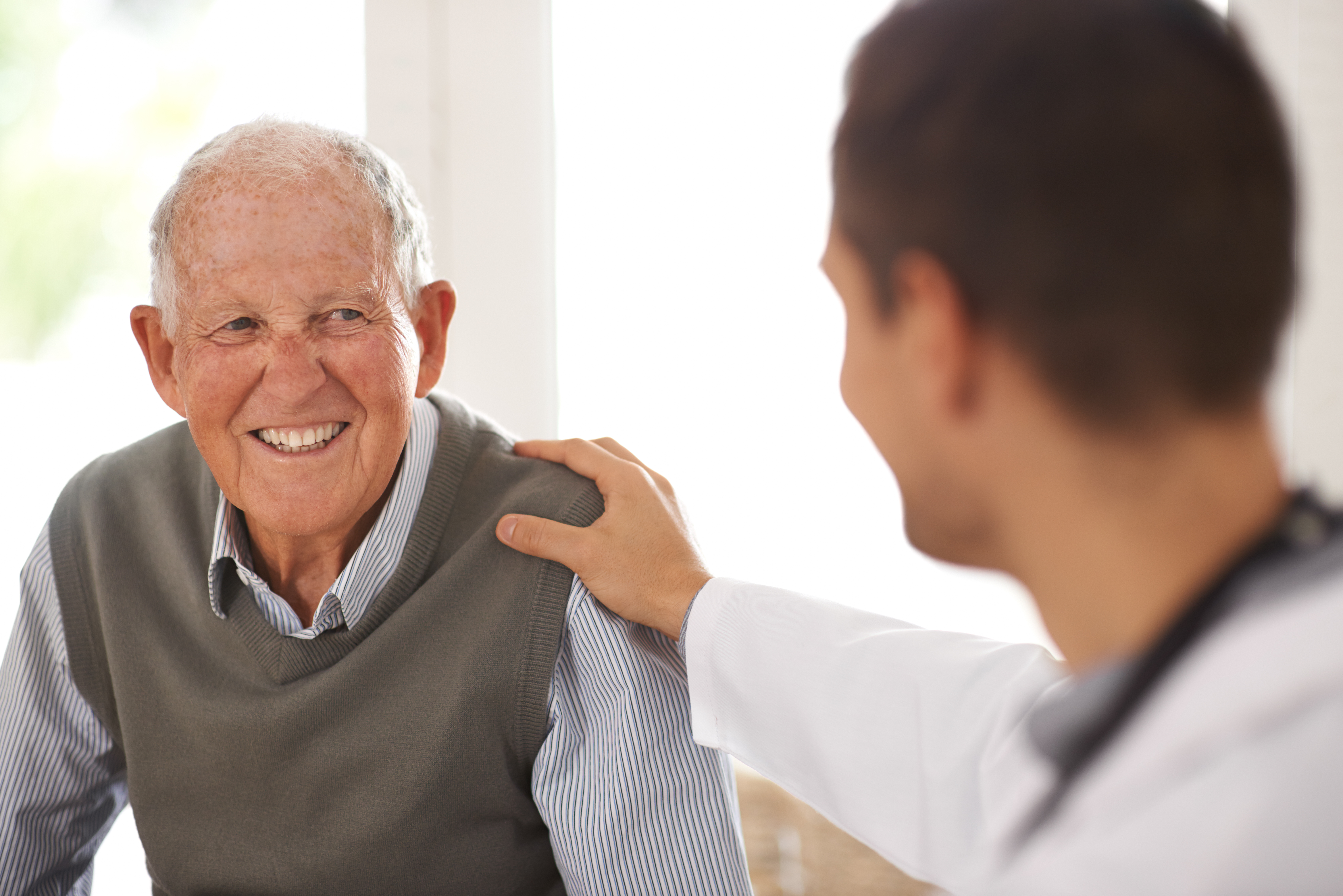 physician speaking to patient