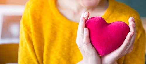 hands holding heart