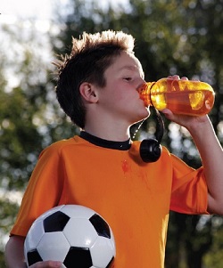 soccer boy drinking sports drink