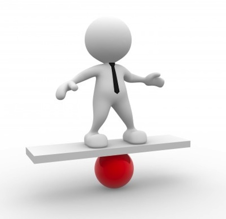man balancing on a beam