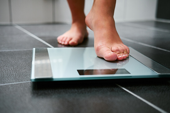 feet of person on scales