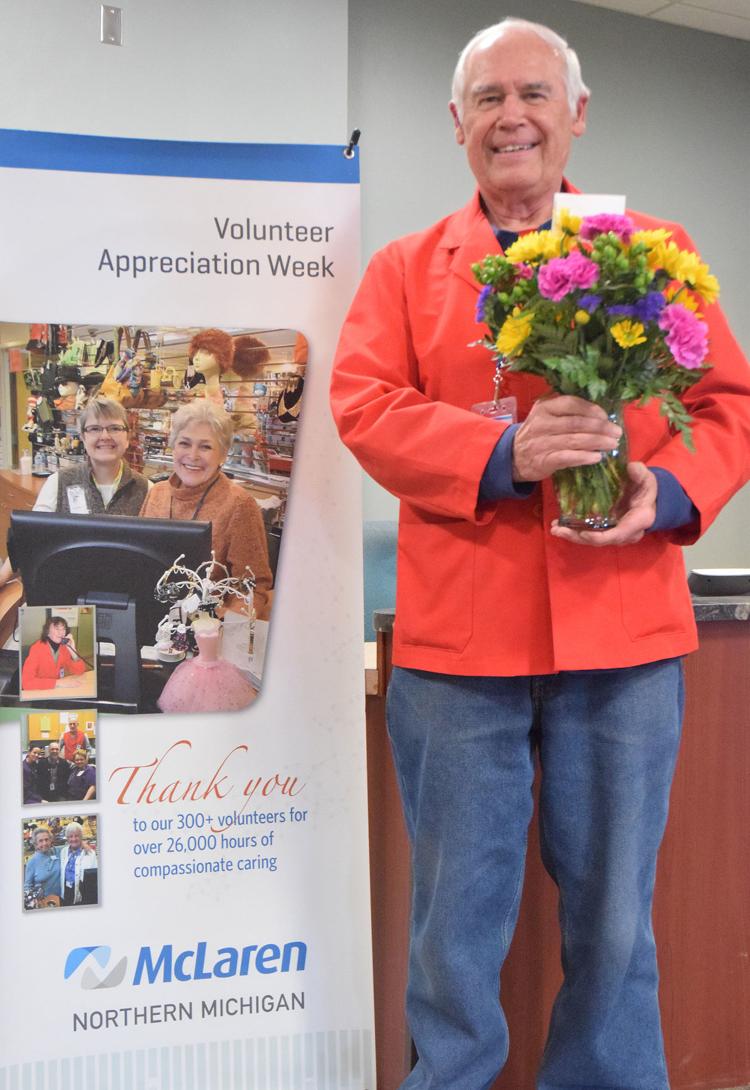 Hugo Graff holding flowers for a patient