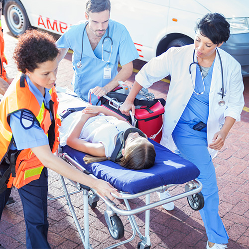 Doctor performing surgery with a team